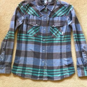 Women’s flannel button down shirt.